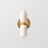 Elegant op-ned-væglampe i akryl